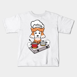 Funny poodle is cooking Kids T-Shirt